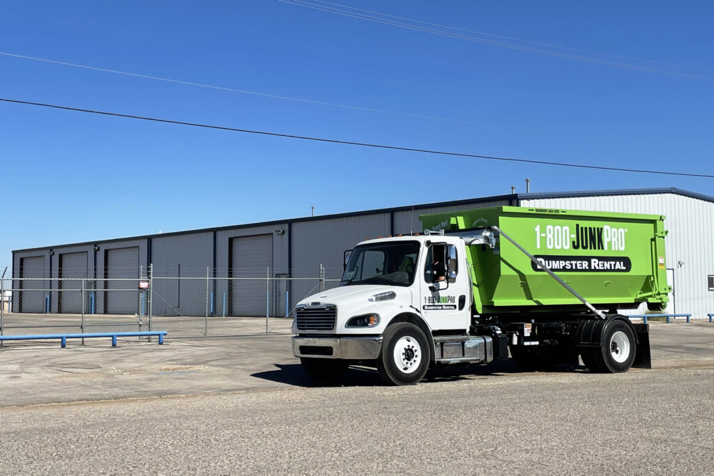 a 1-800-JunkPro Truck with a Rental Dumpster