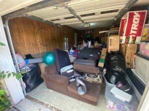A Home Garage full of Misc Junk waiting for Disposal