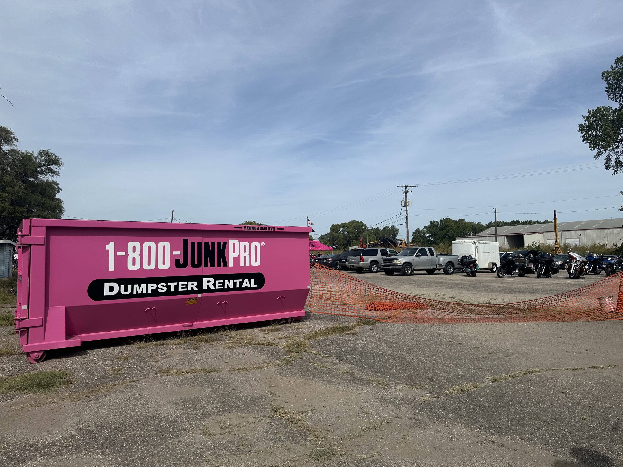 A Large Rented Dumpster in the Parking Lot of an Event